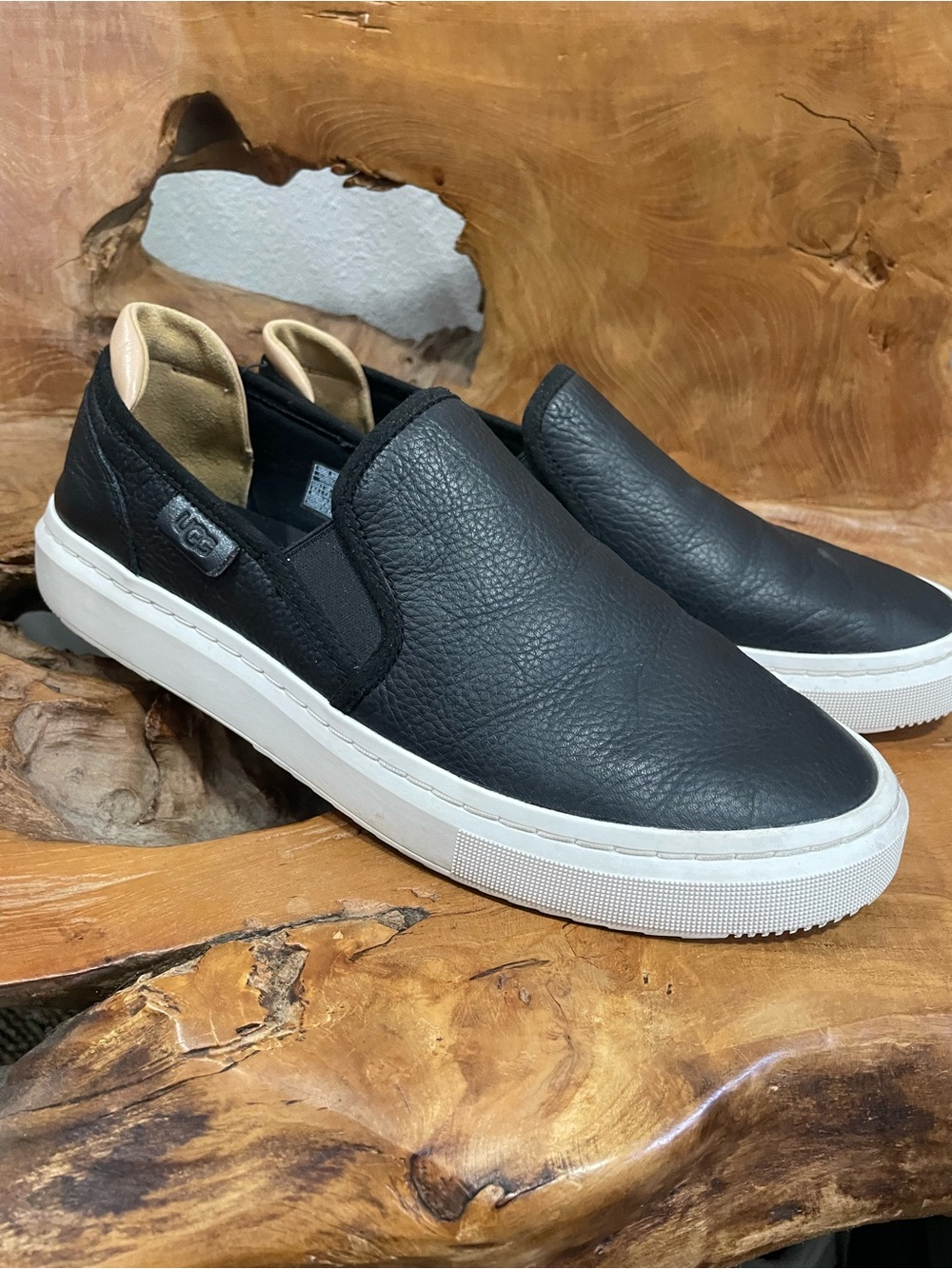 UGG Women’s Black Leather Slip-On Sneakers with White Sole